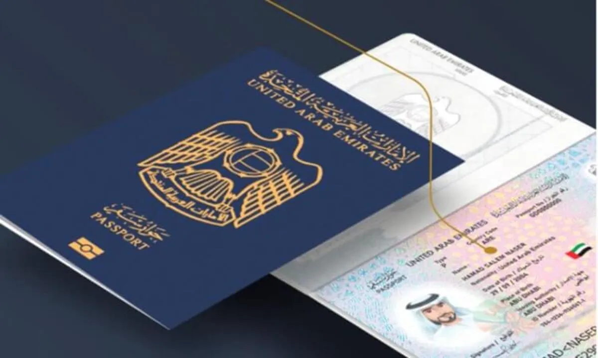 Golden visa service - UAE passport cover and an open page showing personal details and photo.